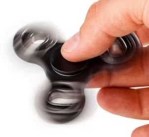 What makes a fidget spinner stop?