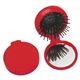aerial view a red brush and mirror compact 2- in -1 mini travel kit, image 1 of 3