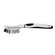 a white with black trim brush - up vegetable brush peeler