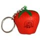 a red strawberry key chain - stress reliever