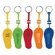 a group of floating flip flop keytag