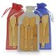 a group of bamboo kitchen tensils combo (cutting board, spoon, spatula)