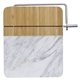 aerial view a white marble marble and bamboo cheese cutting board with slicer, image 1 of 3