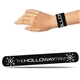 aerial view a black 8 3/4 black slap bracelets, image 1 of 2