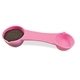 a pink plastic multiuse measuring spoon