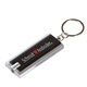 aerial view a black rectangle shaped super bright white led light key chain, image 1 of 2