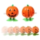 a orange halloween wind - up pumpkin toy