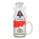 aerial view a white 15 oz full color mug with two packs of hot cocoa, image 1 of 3