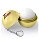 a gold metallic lip balm with keychain
