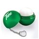 a green metallic lip balm with keychain