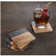 a group of black marble and wood coaster set