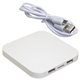aerial view a white power deck wireless charger with dual usb ports, image 1 of 2