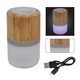 aerial view a woodtone bamboo wireless light up speaker, image 1 of 6