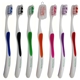 a group of toothbrush with tongue scraper