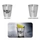 a silver metal shot glasses