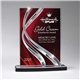 a clear with red small ribbon award