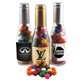 a group of champagne bottle with gumballs