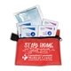 aerial view a red europa 5 piece kit with 3- ply mask antiseptic wipes in zipper pouch, image 3 of 3