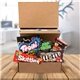 aerial view a kraft sweet tooth assorted candy mailer box, image 1 of 4