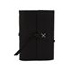aerial view a black leather & white linen accent cooper large journal, image 1 of 2