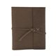 aerial view a distressed brown leather & fuchsia linen accent docker composition book cover, image 1 of 2