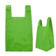 aerial view a lime green reusable t - shirt style non - woven tote bag, image 1 of 2