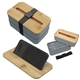 aerial view a gray with black strap stackable bento box with phone stand and bamboo lid, image 1 of 2