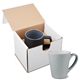 aerial view a white 16oz fleck and timbre ceramic mug in mailer, image 1 of 2