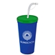 a translucent green lid & royal blue cup 24 oz stadium tumbler cup with flex straw and lid