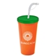 a translucent green lid & orange cup 24 oz stadium tumbler cup with flex straw and lid