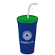 a translucent green lid & navy blue cup 24 oz stadium tumbler cup with flex straw and lid