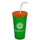 a translucent orange lid & translucent green cup 24 oz stadium tumbler cup with flex straw and lid