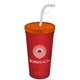 a translucent orange lid & translucent red cup 24 oz stadium tumbler cup with flex straw and lid