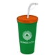 a translucent orange lid & green cup 24 oz stadium tumbler cup with flex straw and lid
