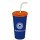 a translucent orange lid & navy blue cup 24 oz stadium tumbler cup with flex straw and lid