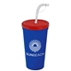 a translucent red lid & royal blue cup 24 oz stadium tumbler cup with flex straw and lid