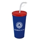 a translucent red lid & navy blue cup 24 oz stadium tumbler cup with flex straw and lid