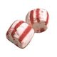 aerial view a group of red striped soft peppermints candies, image 2 of 2