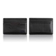 aerial view a black tumi slim card case, image 1 of 4