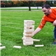 a group of giant wooden tumble tower game
