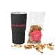 a black soft touch tumbler with party mix