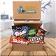 a group of sweet tooth assorted candy mailer box