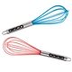 a group of stainless steel handled rubber whisk