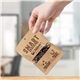 a group of fairtrade dark chocolate almonds in compostable kraft pouch