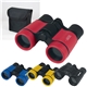 a group of sports binoculars with neck rope