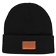 aerial view a black fashion and performance knit cuffed beanie with patch, image 1 of 9