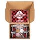 a group of hot cocoa bar kit with 4 mugs