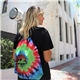 a group of tie - dye drawstring bag