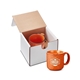 aerial view a orange 15oz campfire ceramic mug in mailer, image 1 of 3