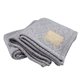 a gray & champagne patch highland cozy wool blend knit blanket